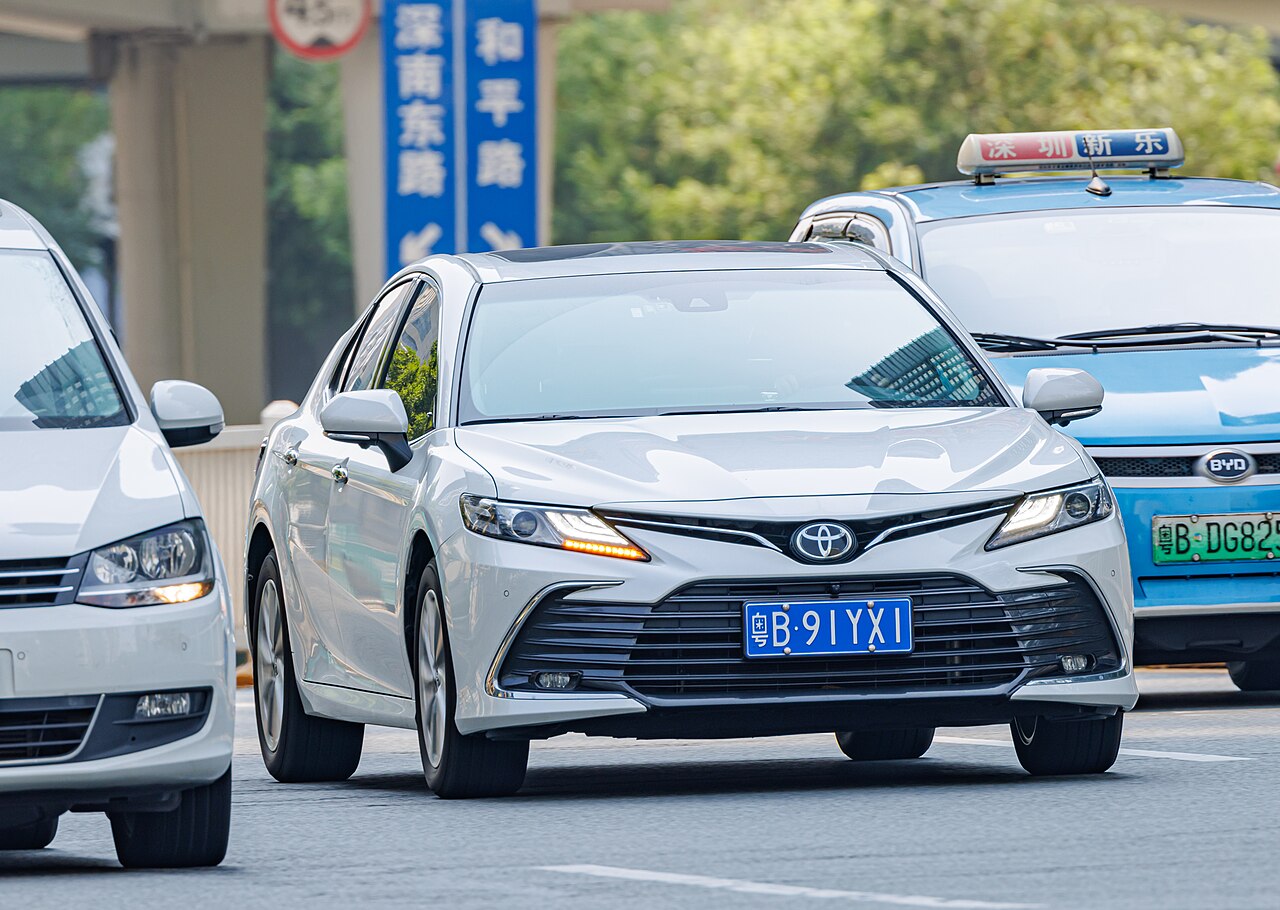 Eighth-generation Toyota Camry XV70 sedan, front three-quarter view