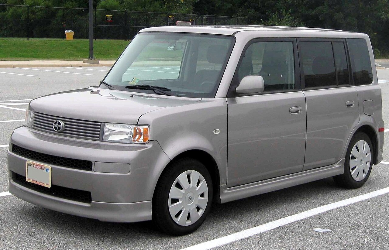 A first-generation Scion xB in profile, showing its tall, upright box shape